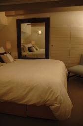 Leather wrapped mirror